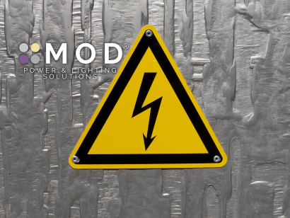 Blog Header of a High Voltage Warning Sign with the MOD logo